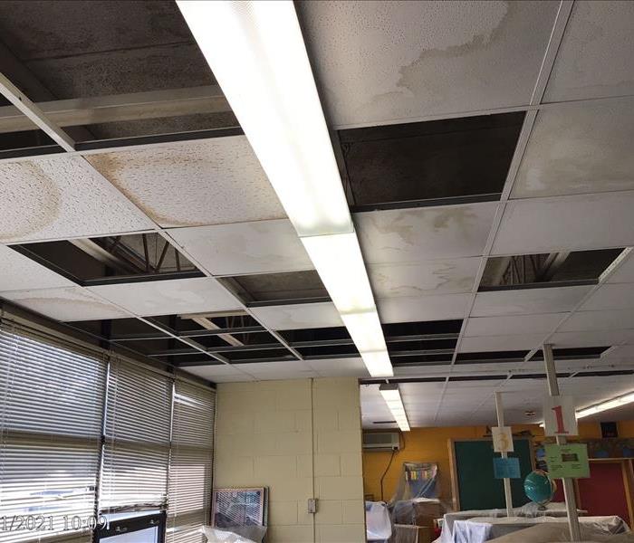 Ceiling tiles damaged due to water 